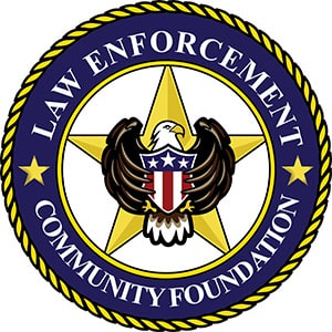 Law Enforcement Community Foundation logo featuring an eagle and star, symbolizing strength and service. Pacific Air Cargo honors and supports law enforcement communities.