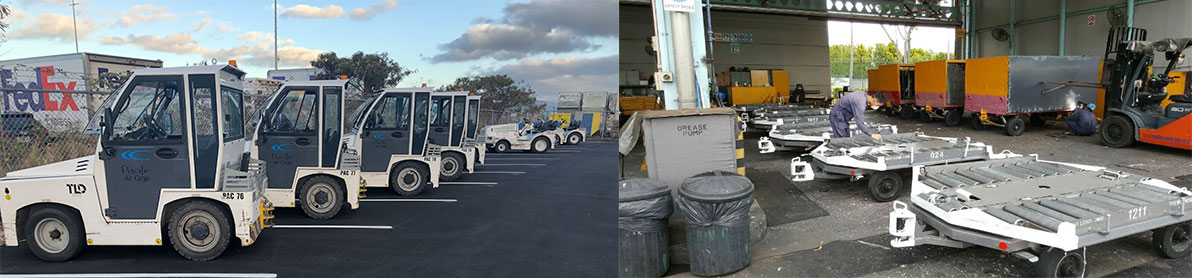 Line of Pacific Air Cargo vehicles parked in a row and workers preparing cargo equipment inside a warehouse.